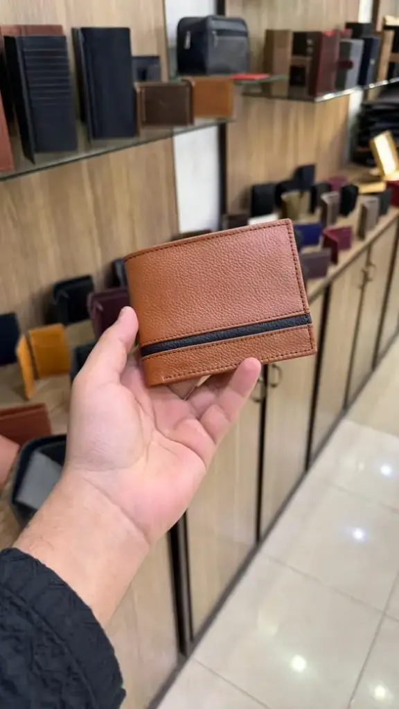 Mustard colour wallet with black strap